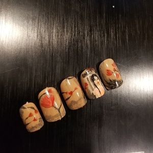 Beautiful floral cherry glue on nails